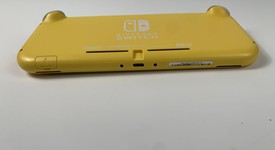 Fair
													Nintendo Switch Lite - Yellow, photo 4 of 7