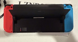 Mint
													Nintendo Switch - OLED - Red & Blue, 64 GB, photo 4 of 7