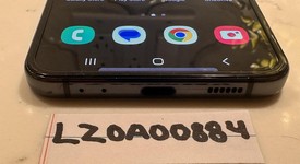 Good
													Samsung Galaxy Z Flip4 5G - T-Mobile, Graphite, 128 GB, 8 GB, SM-F721U, photo 2 of 6