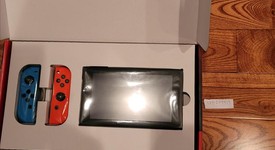 New
													Nintendo Switch - Red & Blue, 32 GB, photo 1 of 1