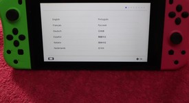 Good
													Nintendo Switch - Pink & Green, 32 GB, photo 1 of 8