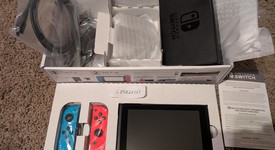 Mint
													Nintendo Switch - Red & Blue, 32 GB, photo 1 of 7