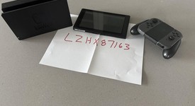 Good
													Nintendo Switch - Grey, 32 GB, photo 1 of 5
