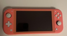 Mint
													Nintendo Switch Lite - Coral, photo 2 of 12