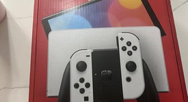 Mint
													Nintendo Switch - OLED - White, 64 GB, photo 1 of 12