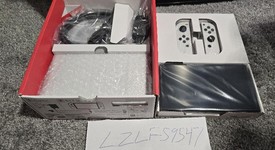 New
													Nintendo Switch - OLED - White, 64 GB, photo 4 of 4