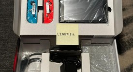 Mint
													Nintendo Switch - Red & Blue, 32 GB, photo 1 of 1