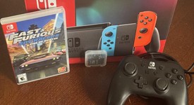 New
													Nintendo Switch - Red & Blue, 32 GB, photo 1 of 4