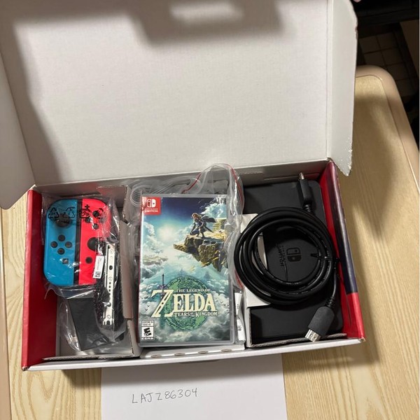 Nintendo Switch - OLED - 64 GB, Red & Blue