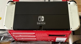 Mint
													Nintendo Switch - OLED - White, 64 GB, photo 3 of 9