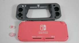 Good
													Nintendo Switch Lite - Coral, photo 2 of 4