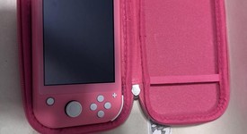 Mint
													Nintendo Switch Lite - Coral, photo 2 of 6