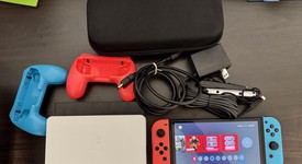 Mint
													Nintendo Switch - OLED - Red & Blue, 64 GB, photo 1 of 9