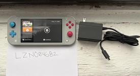 Mint
													Nintendo Switch Lite - Gray, Zacian and Zamazenta Edition, photo 3 of 12