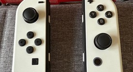 Mint
													Nintendo Switch - OLED - White, 64 GB, photo 5 of 9