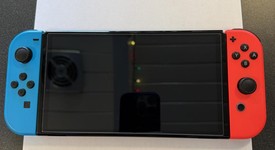 Good
													Nintendo Switch - OLED - Red & Blue, 64 GB, photo 1 of 10