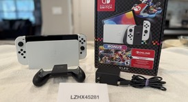 Mint
													Nintendo Switch - OLED - White, 64 GB, photo 1 of 5