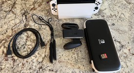 Mint
													Nintendo Switch - OLED - White, 64 GB, photo 4 of 6