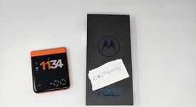 Good
													Motorola Razr (2024) - Unlocked, Orange, 256 GB, 8 GB, photo 1 of 8