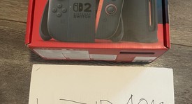 New
													Nintendo Switch 2 - Red & Blue, Standard, photo 1 of 2