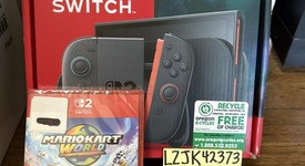 New
													Nintendo Switch 2 - Red & Blue, Standard, photo 1 of 2