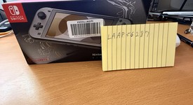 New
													Nintendo Switch Lite - Gray, Dialga & Palkia Edition, photo 1 of 15