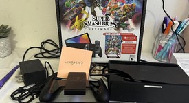 Good
													Nintendo Switch - OLED - Black, 64 GB, Super Smash Bros., photo 1 of 13