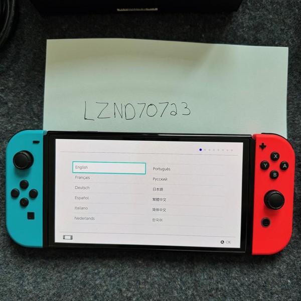Nintendo Switch - OLED - 64 GB, Red & Blue
