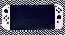 Good
													Nintendo Switch - OLED - White, 64 GB, photo 1 of 12