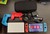 Mint Nintendo Switch - OLED - Red & Blue, 64 GB