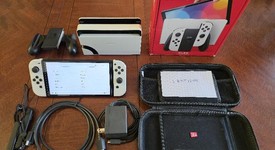 Good
													Nintendo Switch - OLED - White, 64 GB, photo 1 of 6