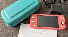 Mint
													Nintendo Switch Lite - Coral, photo 1 of 17