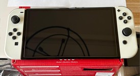 Mint
													Nintendo Switch - OLED - White, 64 GB, photo 2 of 9