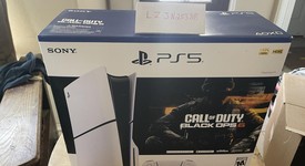 New
													PlayStation 5 Slim Standard Edition (2023) - White, 1 TB, photo 1 of 3