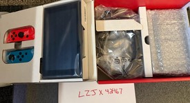 New
													Nintendo Switch - Red & Blue, 32 GB, Mario Red & Blue Edition, photo 2 of 4