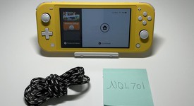 Fair
													Nintendo Switch Lite - Yellow, photo 1 of 7