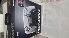 New
													DualSense Wireless Controller - Gray, 30th Anniversary Limited Edition, photo 2 of 3