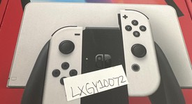 New
													Nintendo Switch - OLED - White, 64 GB, photo 1 of 2