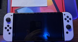 Mint
													Nintendo Switch - OLED - White, 64 GB, photo 3 of 8