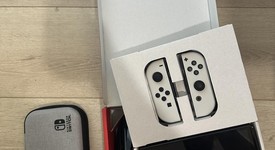 Mint
													Nintendo Switch - OLED - White, 64 GB, photo 3 of 11