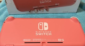 Mint
													Nintendo Switch Lite - Coral, photo 4 of 10