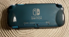 Fair
													Nintendo Switch Lite - Turquoise, photo 1 of 10