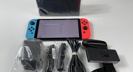 New
													Nintendo Switch - OLED - Red & Blue, 64 GB, photo 2 of 9