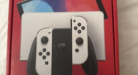 Mint
													Nintendo Switch - OLED - White, 64 GB, photo 2 of 11