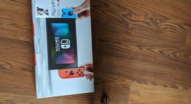 New
													Nintendo Switch - Red & Blue, 32 GB, photo 1 of 2