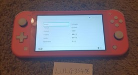 Mint
													Nintendo Switch Lite - Coral, photo 1 of 10