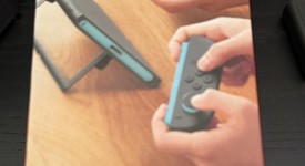 New
													Nintendo Switch 2 - Red & Blue, Standard, photo 6 of 6