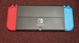 Mint
													Nintendo Switch - OLED - Red & Blue, 64 GB, photo 5 of 8
