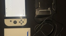 Good
													Nintendo Switch - OLED - White, 64 GB, photo 1 of 2