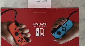New
													Nintendo Switch - Red & Blue, 32 GB, photo 2 of 3